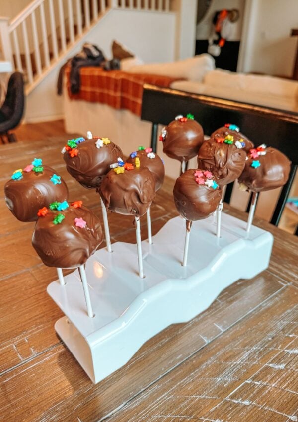 cookie dough cake pops on cake pop stand