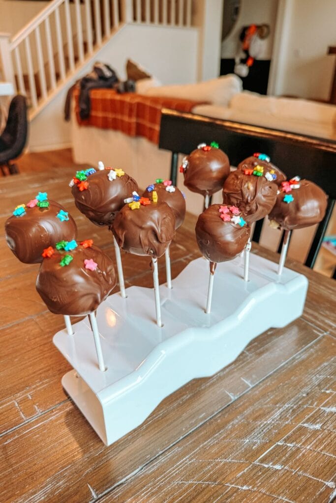 cookie dough cake pops on cake pop stand
